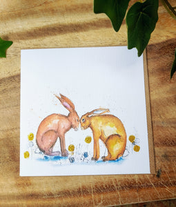 Kissing Hares Greeting Card